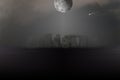 Stonehenge in the fog. Full moon in the sky Royalty Free Stock Photo