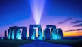 Stonehenge like monument with blue beam emitted from core