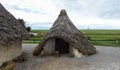 Stonehenge prehistoric monument, Stonehenge Neolithic Houses Exhibition, sunny afternoon - Salisbury, England