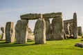 Stonehenge is a prehistoric monument on Salisbury Plain in Wiltshire, England, two miles west of Amesbury.