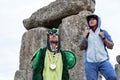 A couple in fancy dress stand on the stones at Stonehenge during the summer solstice celebrations