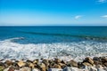 Stones along the rugged coast pacific ocean near Royalty Free Stock Photo