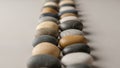 Stones arranged in two parallel rows create a pattern on a flat Royalty Free Stock Photo