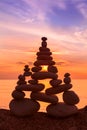 Stones balance on a background of sea sunset. Concept of harmony and balance