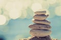 Stones balance at the beach, stack over blue sea Royalty Free Stock Photo