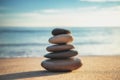 Zen meditation. Stones balance on beach, sunrise shot