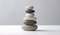 Stones of balance. Pebbles pyramid on white background. For banner, postcard, book illustration. Created with generative AI tools Royalty Free Stock Photo