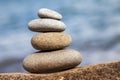 Stones balance, pebbles stack over blue sea in Croatia. Blue sky on sunny adriatic coast in summer Royalty Free Stock Photo