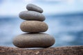 Stones balance, pebbles stack over blue sea in Croatia. Blue sky on sunny adriatic coast in summer Royalty Free Stock Photo