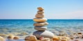 Stones balanced harmoniously beside the sea , concept of Balance