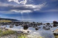 Stones on Baltic sea coast and blue sky Royalty Free Stock Photo