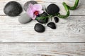 Stones, bamboo, orchid flower and space for text on background, flat lay. Zen lifestyle Royalty Free Stock Photo