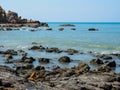 Stones on the beach and blue sky. Royalty Free Stock Photo