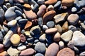 Stones on beach. Decorative texture of stones. Sea stones background. Colored stone on coastline Royalty Free Stock Photo