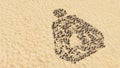 Stones on beach sand handmade symbol shape, golden sandy background, pregnant woman sign Royalty Free Stock Photo
