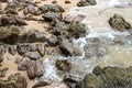 Stones on the beach in surf water Royalty Free Stock Photo