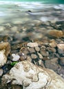 Stones and boulders close-up on a mountain river stream in the background. The Hosta river in yew-boxwood grove park in Sochi, Royalty Free Stock Photo