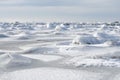 Stones covered in ice in the ocean Royalty Free Stock Photo