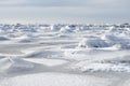 Stones covered in ice in the ocean