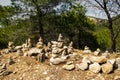 Stones in equilibrium. pile of rocks in the woods. stack of stones in the park.a stone tower.Trekking touristic.Balance Royalty Free Stock Photo