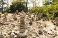 Stones in equilibrium. pile of rocks in the woods. stack of stones in the park.a stone tower.Trekking touristic.Balance Royalty Free Stock Photo