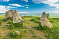 Stones in a field with round holes in Karahunj - Armenian Stonehenge, Zorats Karer