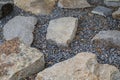Stones on gravel bed garden architecture, pathway accessory. Royalty Free Stock Photo