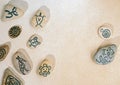 Stones with hand-drawn taino petroglyphs symbols Royalty Free Stock Photo