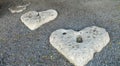 Stones in heart form on sand Royalty Free Stock Photo