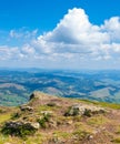 Stones on a hillside with beautiful sky. Royalty Free Stock Photo