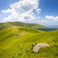 Stones on the hillside with lake Royalty Free Stock Photo