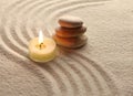 Stones and light candle Royalty Free Stock Photo