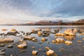 Stones lit by sun at sunset, lake Tekapo, New Zealand Royalty Free Stock Photo