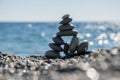 Stones and pebbles stack, harmony and balance, One big pyramid stone cairn on seacoast Royalty Free Stock Photo