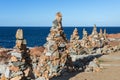 Stones Piled on Each Other near Coastline: Rocks and Cliffs near Sea