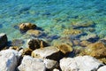 Stones, rocks and transparent water, background