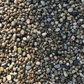 Stones are rounded varying in size and shape creating a natural textured Royalty Free Stock Photo