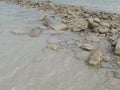 Stones and sand on Fuwairit Beach in Qatar Royalty Free Stock Photo