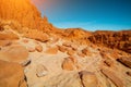 Stones on the sand near the mountains in the desert Royalty Free Stock Photo