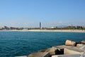 Stones, sea, beach and buildings in Barcelona in Spain Royalty Free Stock Photo