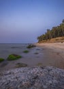 stones on the shore of the Baltic Sea after sunset Royalty Free Stock Photo