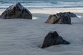 Stones on the snowy beach, long exposure at Lofoten islands, Norway.