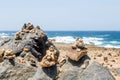 Stones Stacked on Black Volcanic Rock Royalty Free Stock Photo