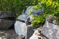 Stones stacked in a pyramid along the road. Royalty Free Stock Photo