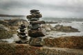 Stones stacked on a rocky shoreline