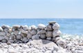 Stones stacked into a wall at the seaside Royalty Free Stock Photo
