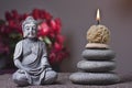 Stones tower and candle, buddha Royalty Free Stock Photo