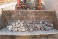 Stones in the tractor bucket Royalty Free Stock Photo