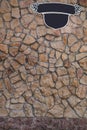 Stones wall and signboard Royalty Free Stock Photo
