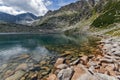 Stones in the water and reflection of Musalenski lakes, Rila mountain